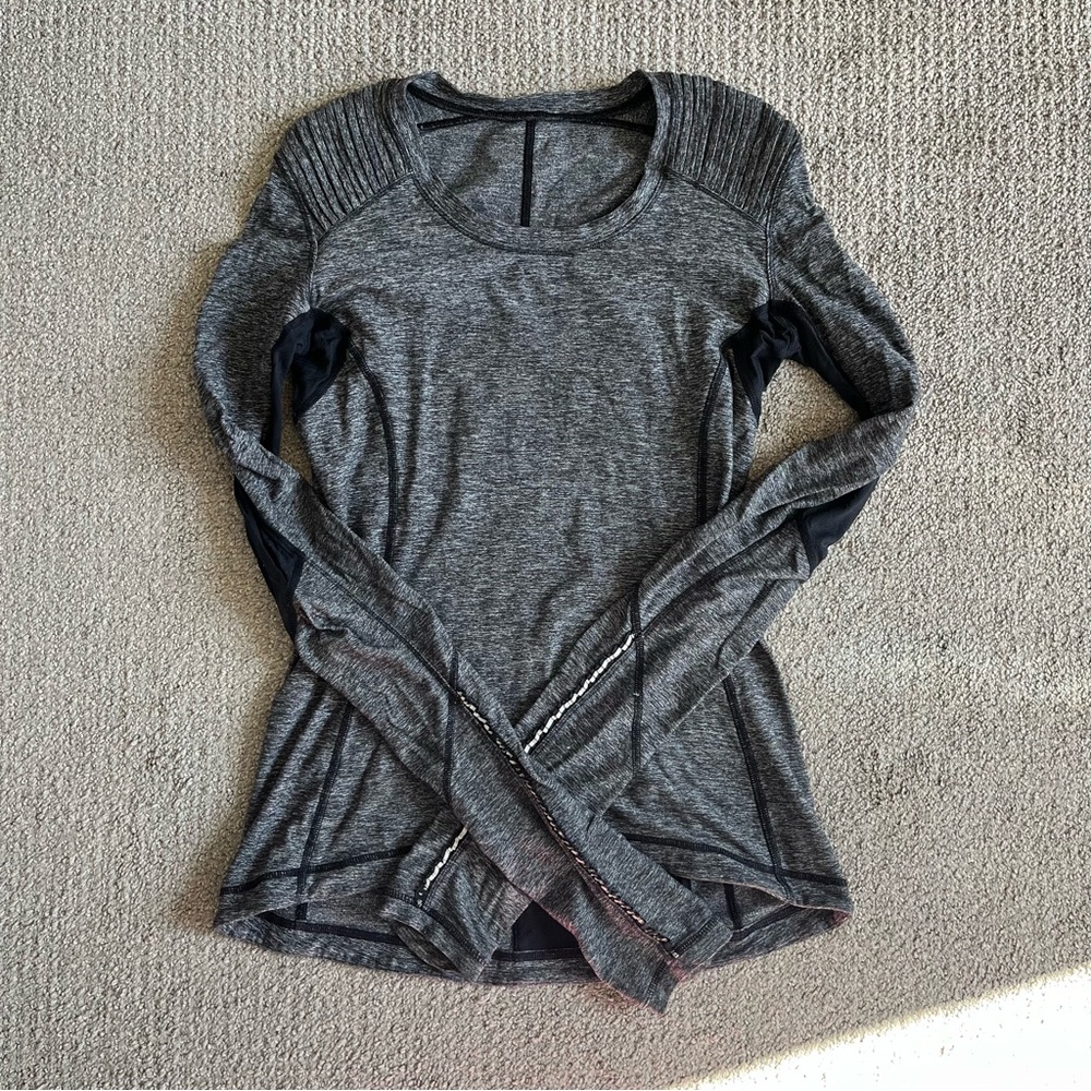 Grey lululemon long sleeve top with thumb holes and back pocket
